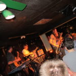 Justin Harris busts out the baritone sax.