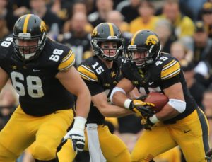 Iowa quarterback Jake Rudock hands the ball to running back Mark Weisman against Michigan State on Saturday, Oct. 5, 2013, at Kinnick Stadium in Iowa City. (Bryon Houlgrave/The Des Moines Register)