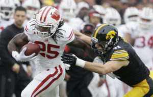 Wisconsin Melvin Gordon totaled 207 rushing yards and two touchdowns as he led led the Badgers past the Hawkeyes. (Photo: AP Photo/Charlie Neibergall)