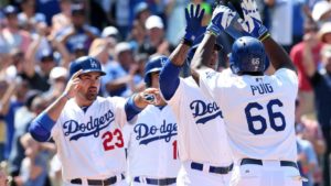 The Dodgers celebrate a home run. (Photo Credit: Stephen Dunn / Getty Images North America)
