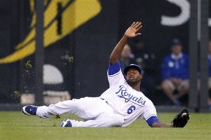 Lorenzo Cain makes a sliding catch. (Photo Credit: AP Photo/Colin E. Braley)