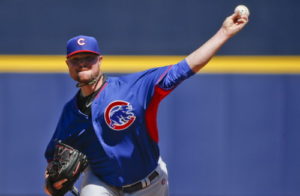 Jone Lester delivers a fastball. (Photo Credit: AP Photo)