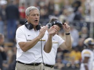 Kirk Ferentz shows his approval after his team scored a touchdown (Brian Spurlock USA Today Sports).