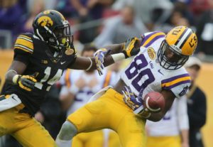 King defends a pass against LSU Receiver Jarvis Landry (photo: Bryon Houlgrave/The Register)