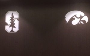 Iowa and Stanford team logos side by side