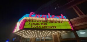 Englert Theatre sign showing MISSION CREEK FEST APR 6-8 APR 7: SNAIL MAIL SUDAN ARCHIVES